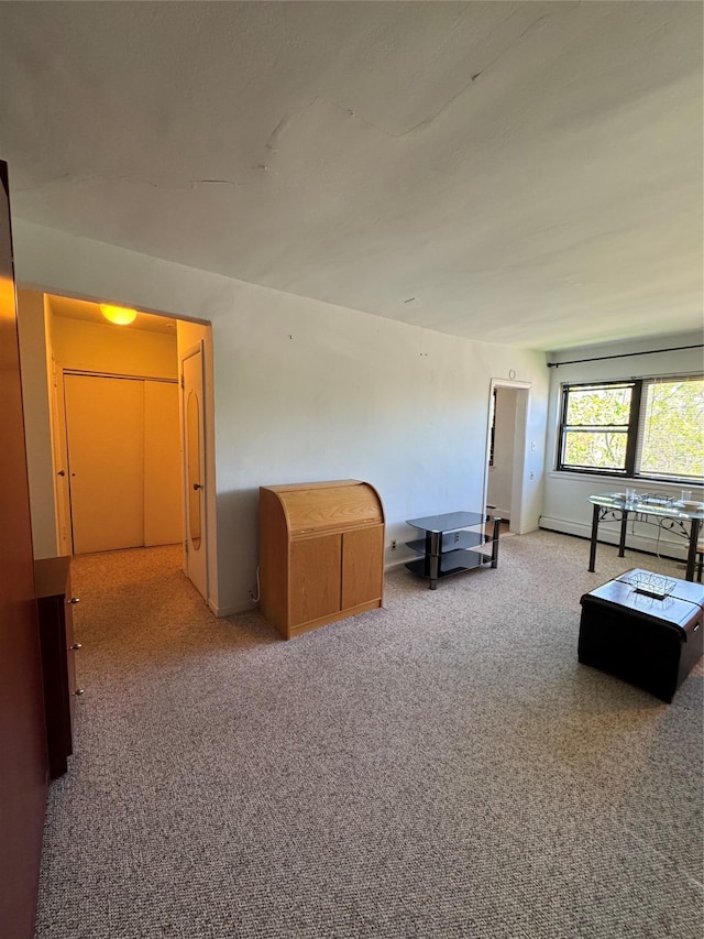 91 Tulip Ave Unit C2, Floral Park, NY 11001 - interior space with carpet floors and a baseboard radiator