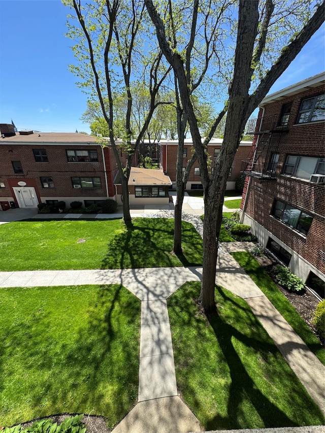 91 Tulip Ave Unit C2, Floral Park, NY 11001 - view of home's community featuring a lawn