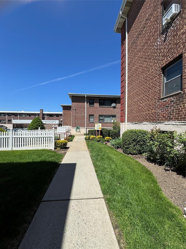 91 Tulip Ave Unit C2, Floral Park, NY 11001 - view of property's community featuring fence