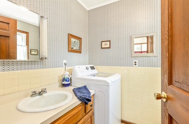 8 Parkside Ave, Miller Place, NY 11764 - bathroom with washer / clothes dryer, wallpapered walls, tile walls, and crown molding