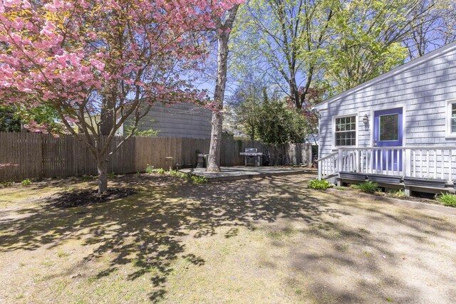8 Parkside Ave, Miller Place, NY 11764 - view of yard featuring fence and a deck