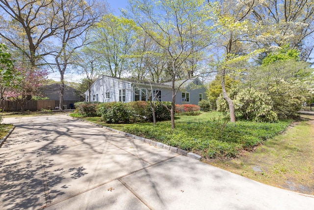 8 Parkside Ave, Miller Place, NY 11764 - ranch-style house featuring fence and concrete driveway