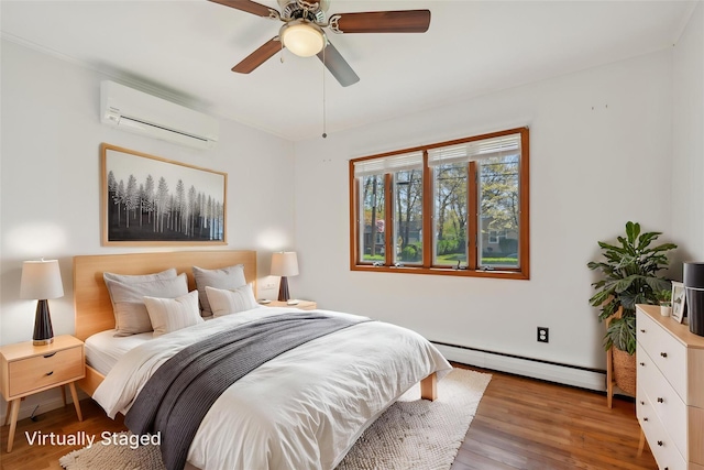 bedroom with ceiling fan, a wall unit AC, wood finished floors, and a baseboard radiator