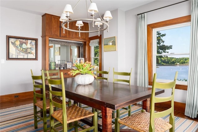 0 Rich, Greenwich, CT 06830 - dining area with wood finished floors and a notable chandelier