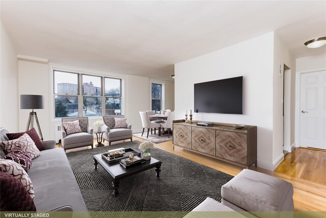 living area featuring light wood-style flooring