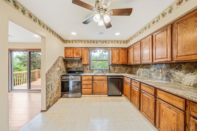 40 Cedarhurst St, Islip Terrace, NY 11752 - kitchen with dishwasher, stainless steel range with gas cooktop, a sink, brown cabinetry, and recessed lighting
