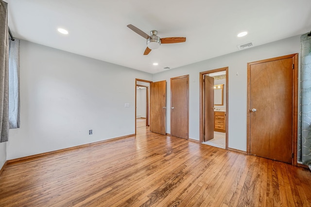 40 Cedarhurst St, Islip Terrace, NY 11752 - unfurnished bedroom featuring light wood finished floors, baseboards, ensuite bath, a ceiling fan, and recessed lighting