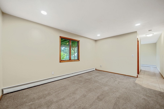 40 Cedarhurst St, Islip Terrace, NY 11752 - empty room with a baseboard heating unit, light carpet, recessed lighting, and baseboards