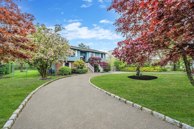 40 Cedarhurst St, Islip Terrace, NY 11752 - split foyer home with asphalt driveway and stairway