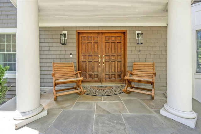 entrance to property with covered porch