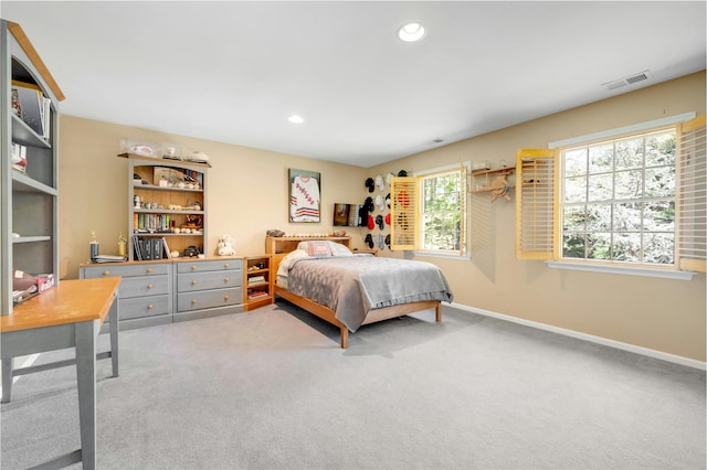 bedroom featuring recessed lighting, baseboards, visible vents, and carpet