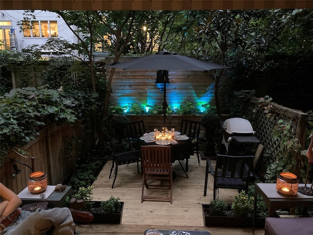 242 Baltic St Unit 12, Brooklyn, NY 11201 - wooden deck with an outdoor fire pit and fence