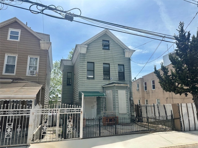 230 Sunnyside Ave, Brooklyn, NY 11207 - view of front of property with a gate, a fenced front yard, and cooling unit