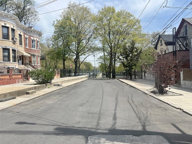 230 Sunnyside Ave, Brooklyn, NY 11207 - view of street featuring street lights, sidewalks, and curbs