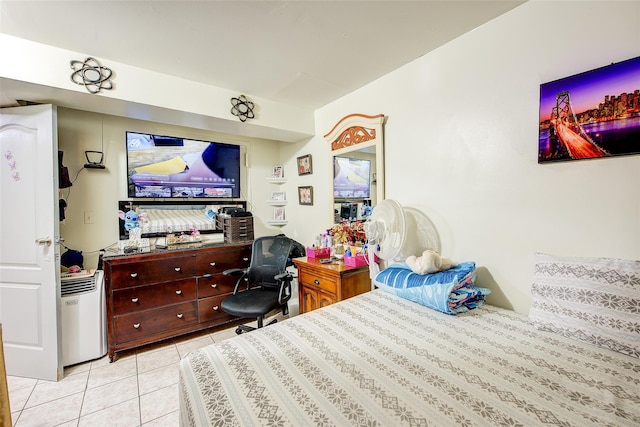 bedroom featuring light tile patterned floors