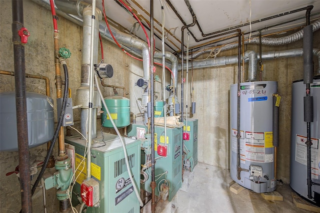 utility room featuring a heating unit and water heater