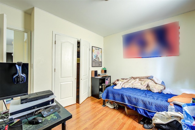 bedroom with light wood-type flooring