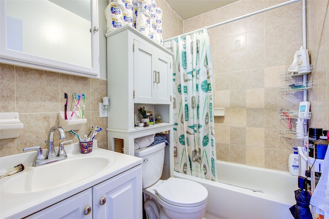 bathroom featuring vanity, toilet, and shower / tub combo with curtain