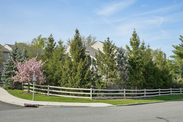 view of road with curbs and sidewalks