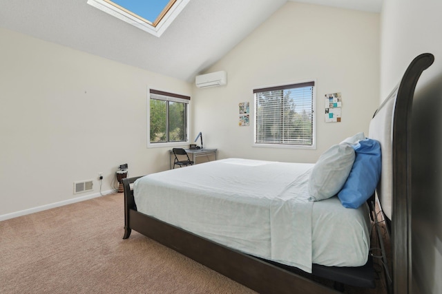 bedroom with visible vents, baseboards, a wall unit AC, carpet flooring, and a skylight