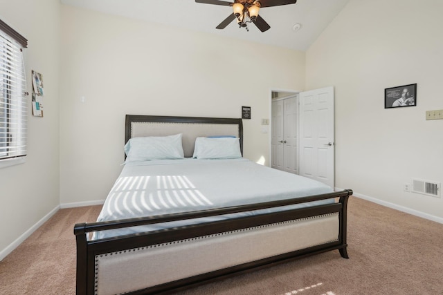 bedroom with visible vents, baseboards, ceiling fan, and light carpet