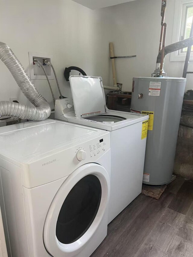 47 Ontario St, Port Jefferson Station, NY 11776 - washroom featuring gas water heater, dark wood-style floors, independent washer and dryer, and laundry area