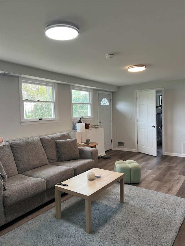 47 Ontario St, Port Jefferson Station, NY 11776 - living area with baseboards, wood finished floors, and visible vents