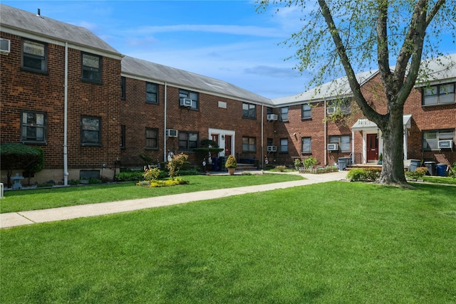 19-32 202nd St Apt # 1-179, Whitestone, NY 11360 - view of building exterior featuring cooling unit