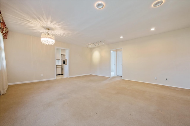 19-32 202nd St Apt # 1-179, Whitestone, NY 11360 - empty room featuring light colored carpet, baseboards, a chandelier, and recessed lighting