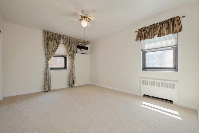 19-32 202nd St Apt # 1-179, Whitestone, NY 11360 - carpeted spare room featuring radiator, ceiling fan, baseboards, and a wealth of natural light