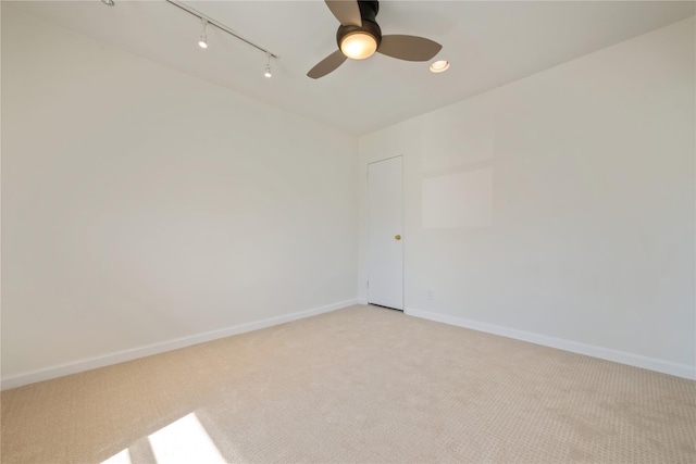 19-32 202nd St Apt # 1-179, Whitestone, NY 11360 - spare room with ceiling fan, light colored carpet, track lighting, and baseboards