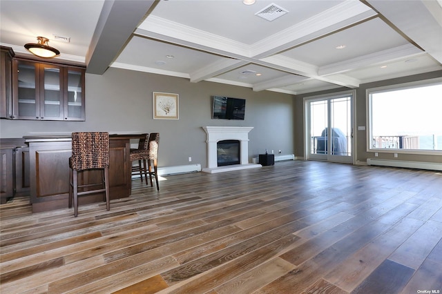 living room with hardwood / wood-style floors, a baseboard radiator, beamed ceiling, visible vents, and coffered ceiling