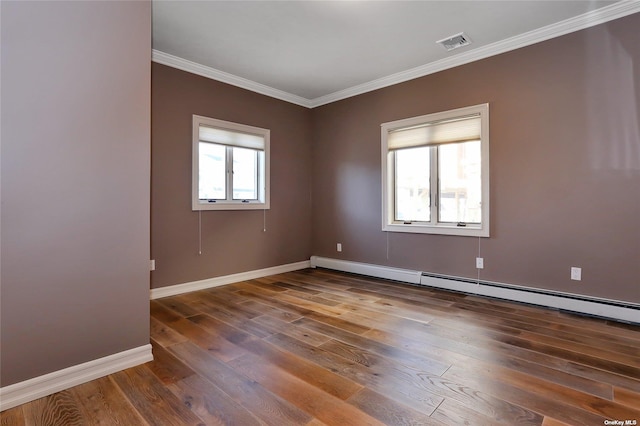 unfurnished room with wood-type flooring, ornamental molding, baseboards, and a baseboard heating unit