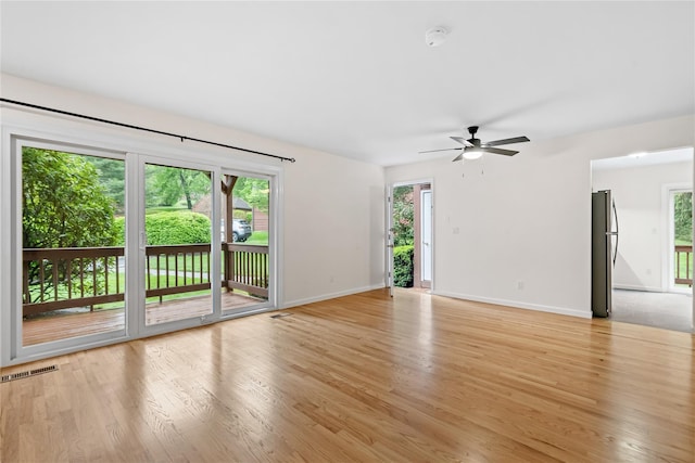 405 Driftway Ln, Brewster, NY 10509 - spare room with light wood-type flooring, baseboards, and ceiling fan