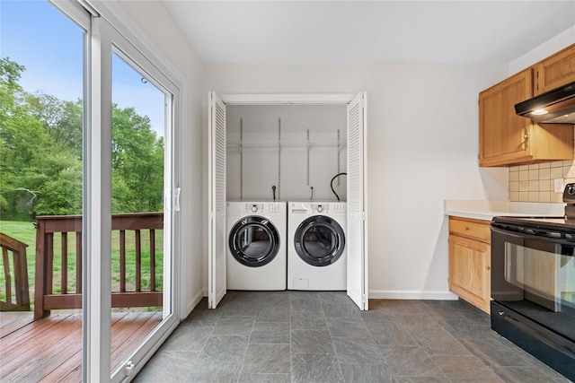 405 Driftway Ln, Brewster, NY 10509 - laundry area with washer and dryer, baseboards, and stone finish flooring