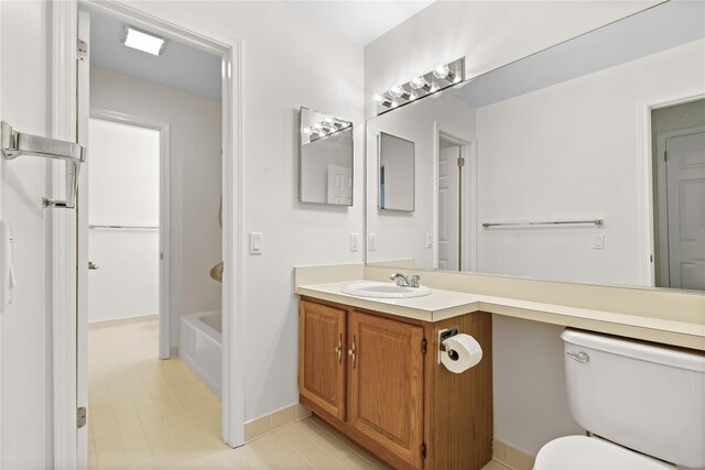 405 Driftway Ln, Brewster, NY 10509 - bathroom featuring toilet, vanity, a tub to relax in, baseboards, and a shower