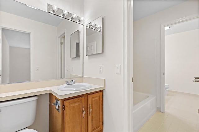 405 Driftway Ln, Brewster, NY 10509 - bathroom featuring toilet, vanity, and a bathtub