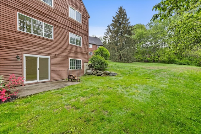 405 Driftway Ln, Brewster, NY 10509 - view of green lawn featuring a patio