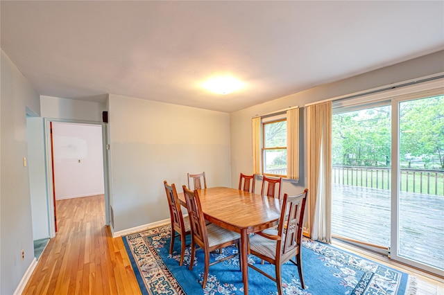 48 Crocus Ln, Commack, NY 11725 - dining area featuring light wood-style floors and baseboards