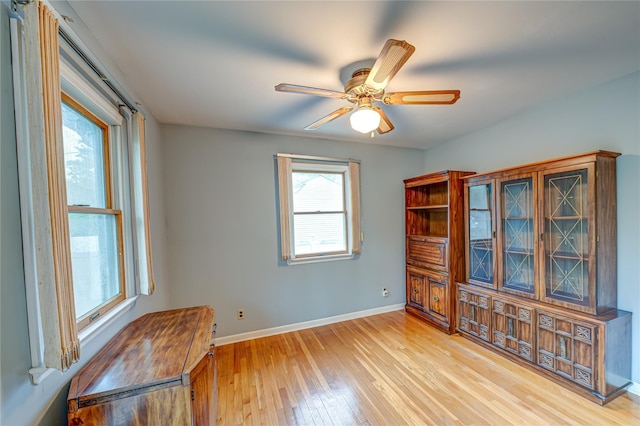 48 Crocus Ln, Commack, NY 11725 - spare room featuring light wood-type flooring, baseboards, and ceiling fan