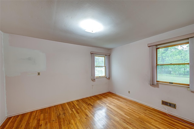48 Crocus Ln, Commack, NY 11725 - empty room featuring light wood finished floors and baseboards
