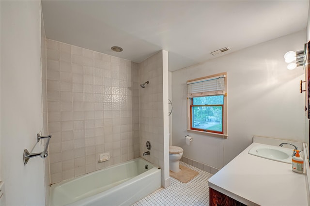 48 Crocus Ln, Commack, NY 11725 - bathroom with tile patterned floors, toilet, vanity, tub / shower combination, and baseboards