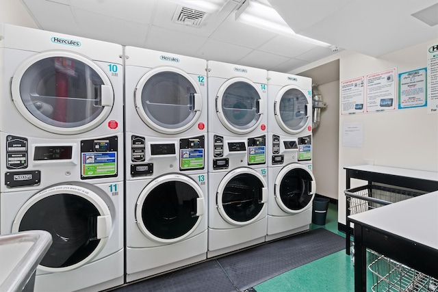 community laundry room with visible vents, a sink, stacked washing maching and dryer, and independent washer and dryer