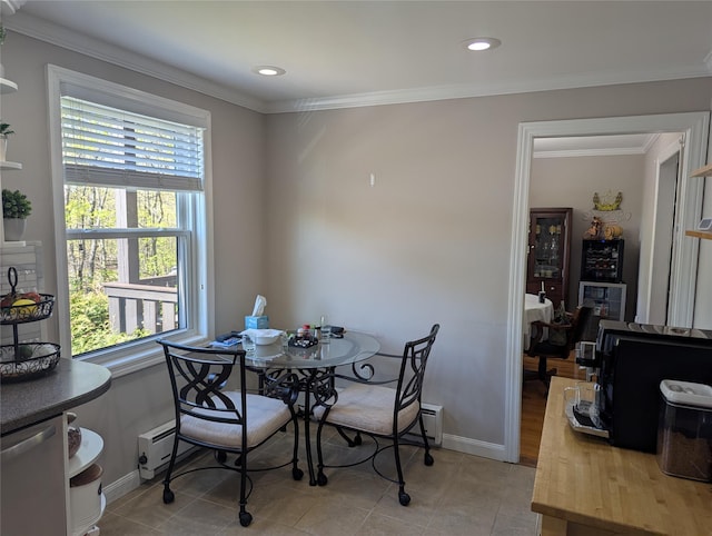 dining room with crown molding, baseboards, and light tile patterned flooring