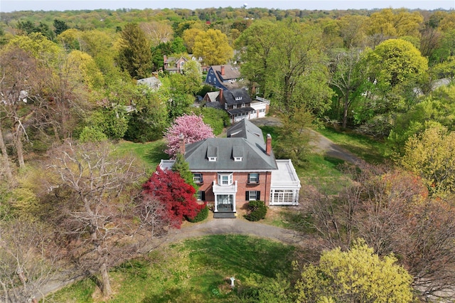 drone / aerial view with a forest view
