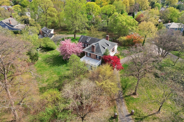 aerial view with a wooded view