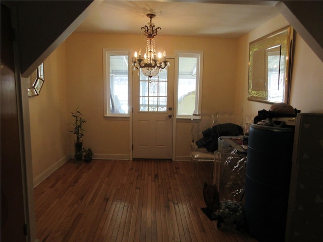 3922 Ely Ave, Bronx, NY 10466 - doorway featuring baseboards, a chandelier, and hardwood / wood-style floors