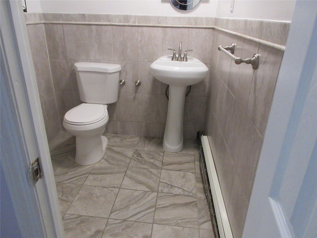 3922 Ely Ave, Bronx, NY 10466 - bathroom with baseboard heating, toilet, and tile walls