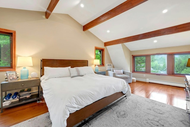 38A Claremont Rd, Scarsdale, NY 10583 - bedroom with a baseboard heating unit, wood finished floors, and recessed lighting
