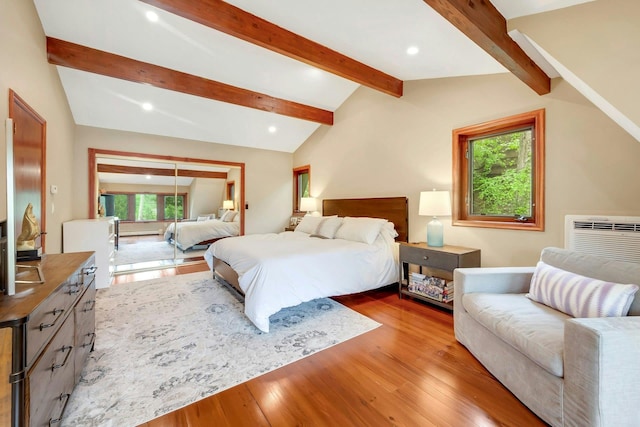 38A Claremont Rd, Scarsdale, NY 10583 - bedroom with wood finished floors, a wall mounted AC, and recessed lighting